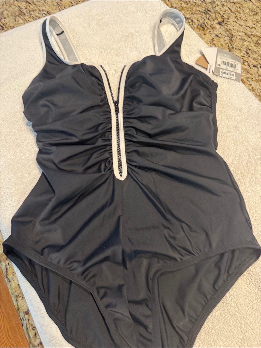 Reebok Black and White One-Piece Swimsuit with Front Zip. New and never worn.